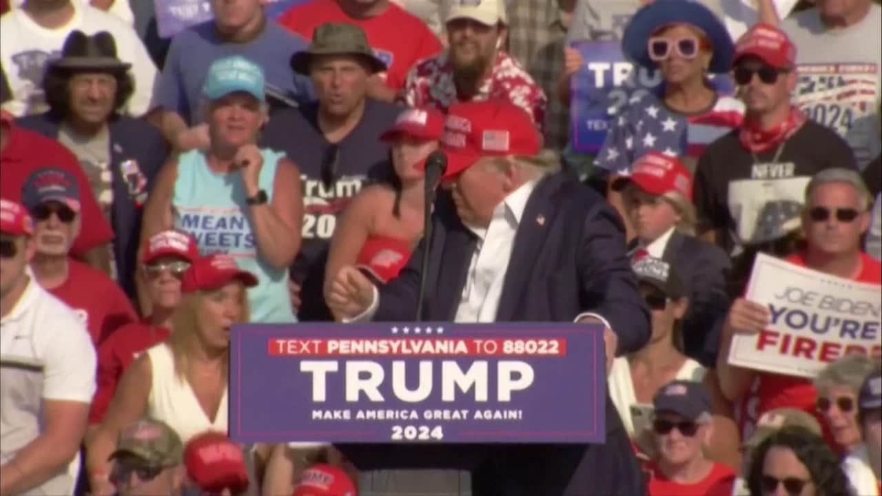 Beelden van het moment dat Trump wordt beschoten.