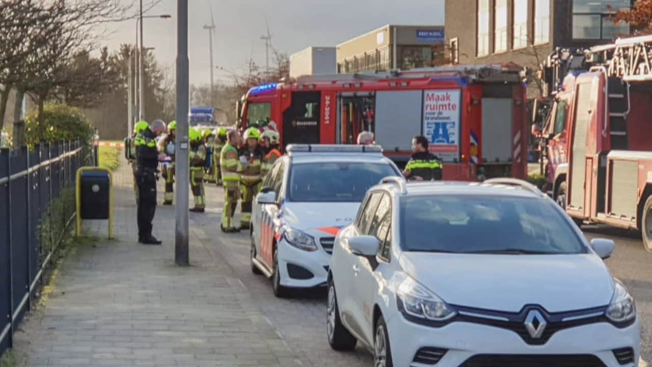Hulpdiensten bij de plaats van de explosies: