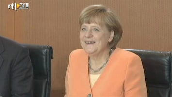 Editie NL Cool! Merkel steunt oranje!