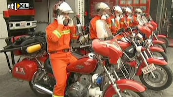 RTL Nieuws Brandweer in Peking pakt de motor