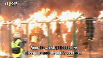 Voetbalhooligans Rellen, traangas en brandende sjaals