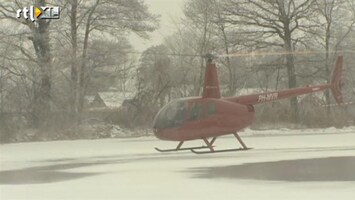 RTL Nieuws Heli blaast sneeuw van ijsbaan