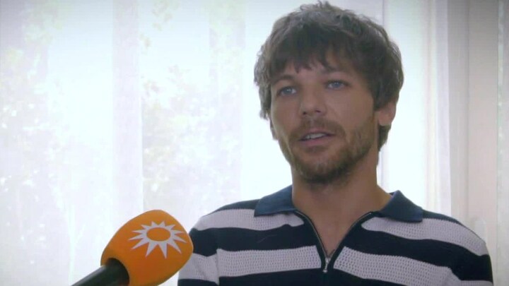 Louis Tomlinson moest wennen aan solo optreden: ‘Niet zo fit’  